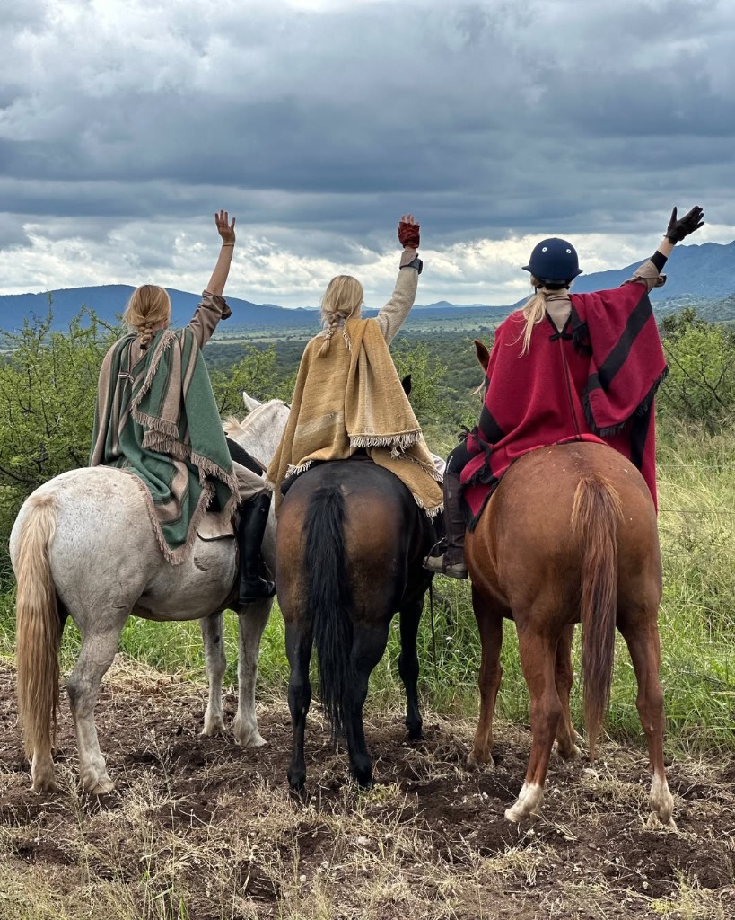 Shirley and companions on horseback